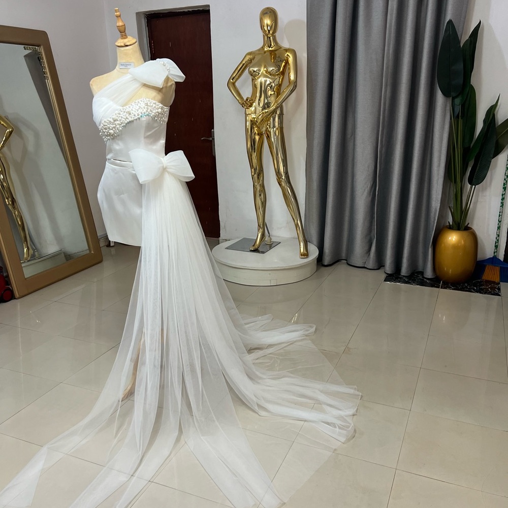 Elegant White One-Shoulder Gown with Bow